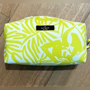Never been used adorable Kate Spade cosmetic case. Zip top, lined inside.